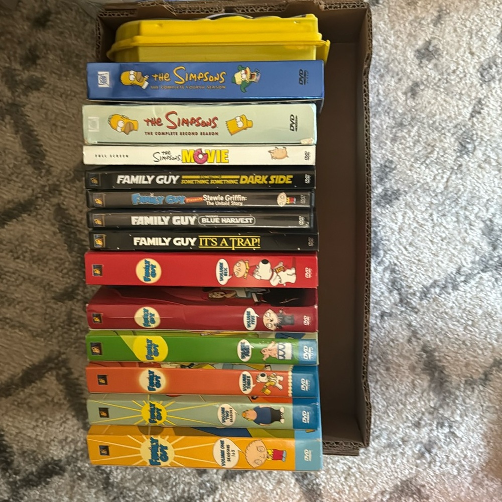 A Lot of Family Guy and Simpsons DVDsq